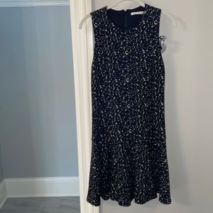 Alice & Olivia sleeveless dress with razor back, black cream color.